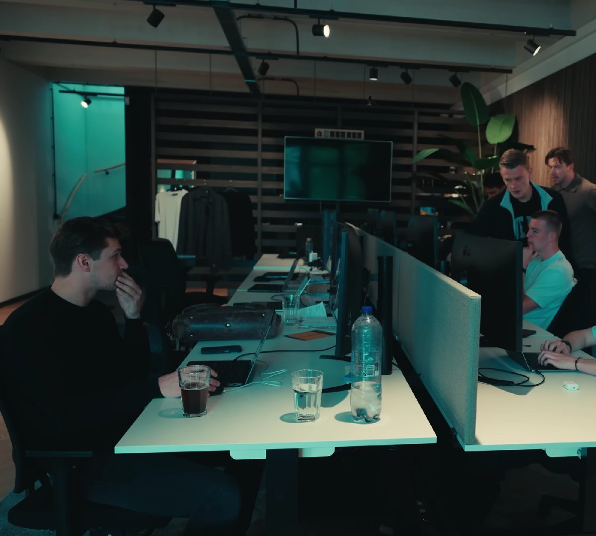 The team reviewing performance data in the studio